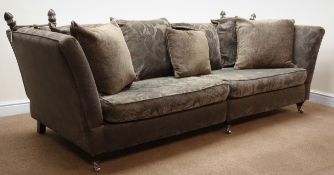 Knole drop side four seat sofa, upholstered in a purple and grey floral fabric,