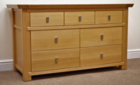 Ponsfords of Sheffield solid light oak chest, three short and four long drawers, stile supports,