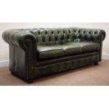 Three seat Chesterfield sofa, upholstered in deep buttoned green leather,