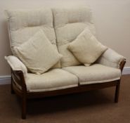 Ercol Saville two seat sofa in Golden Dawn elm finish, upholstered in a neutral fabric,