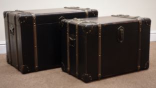 Set two graduating vintage style travelling trunks, wood and metal bound sides,