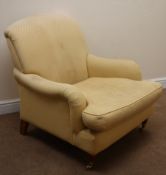 Laura Ashley Howard style armchair, upholstered in a gold patterned fabric, turned supports,