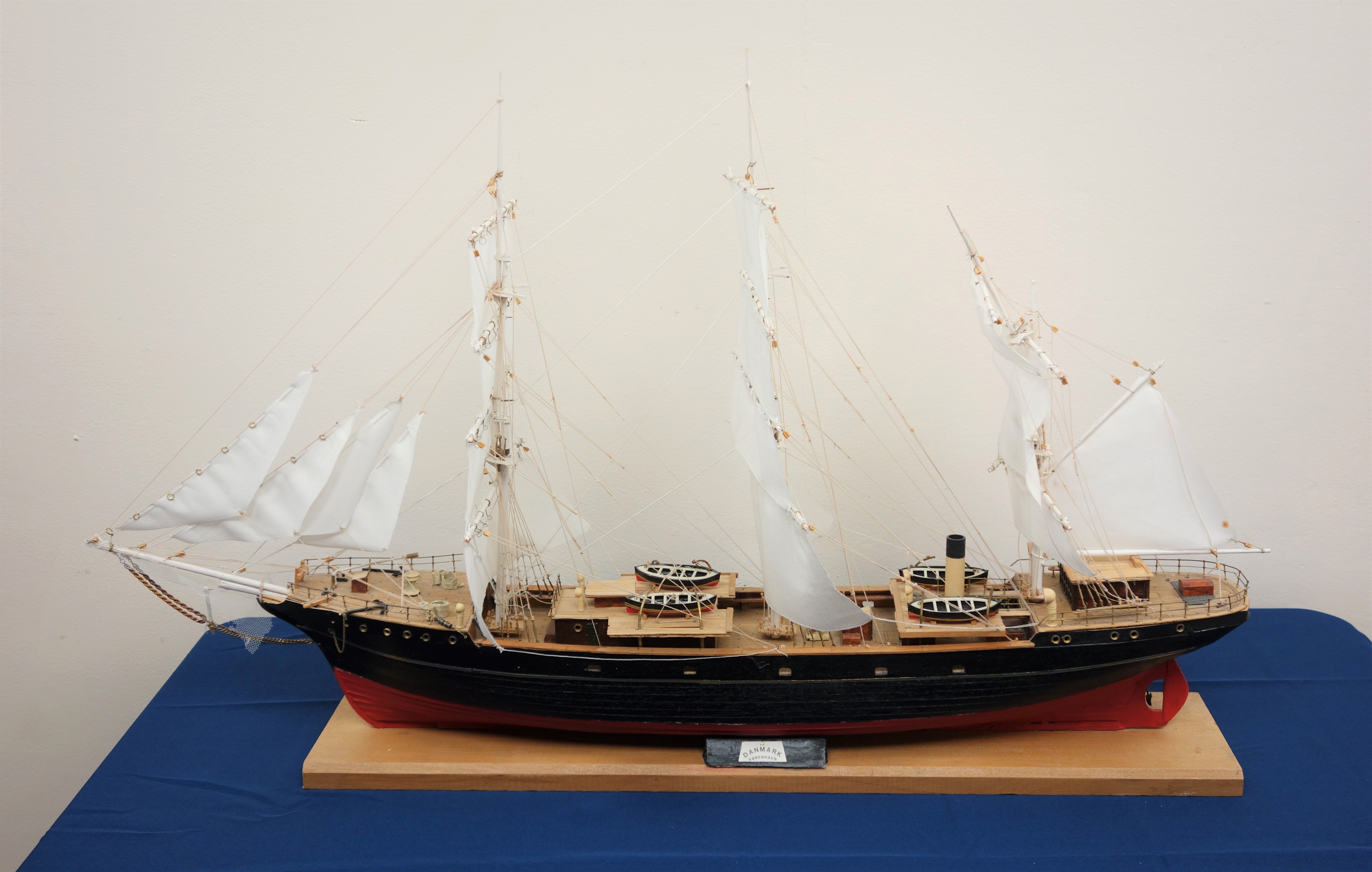 Scale model of the Danish three masted Training Ship 'Danmark' fully rigged on integral stand,