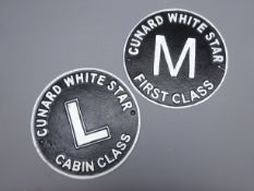 Two replica White Star Line cast metal circular cabin signs,