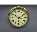 Smiths brass cased Ship's bulkhead clock, cream Roman dial with black hand and red sweep seconds,