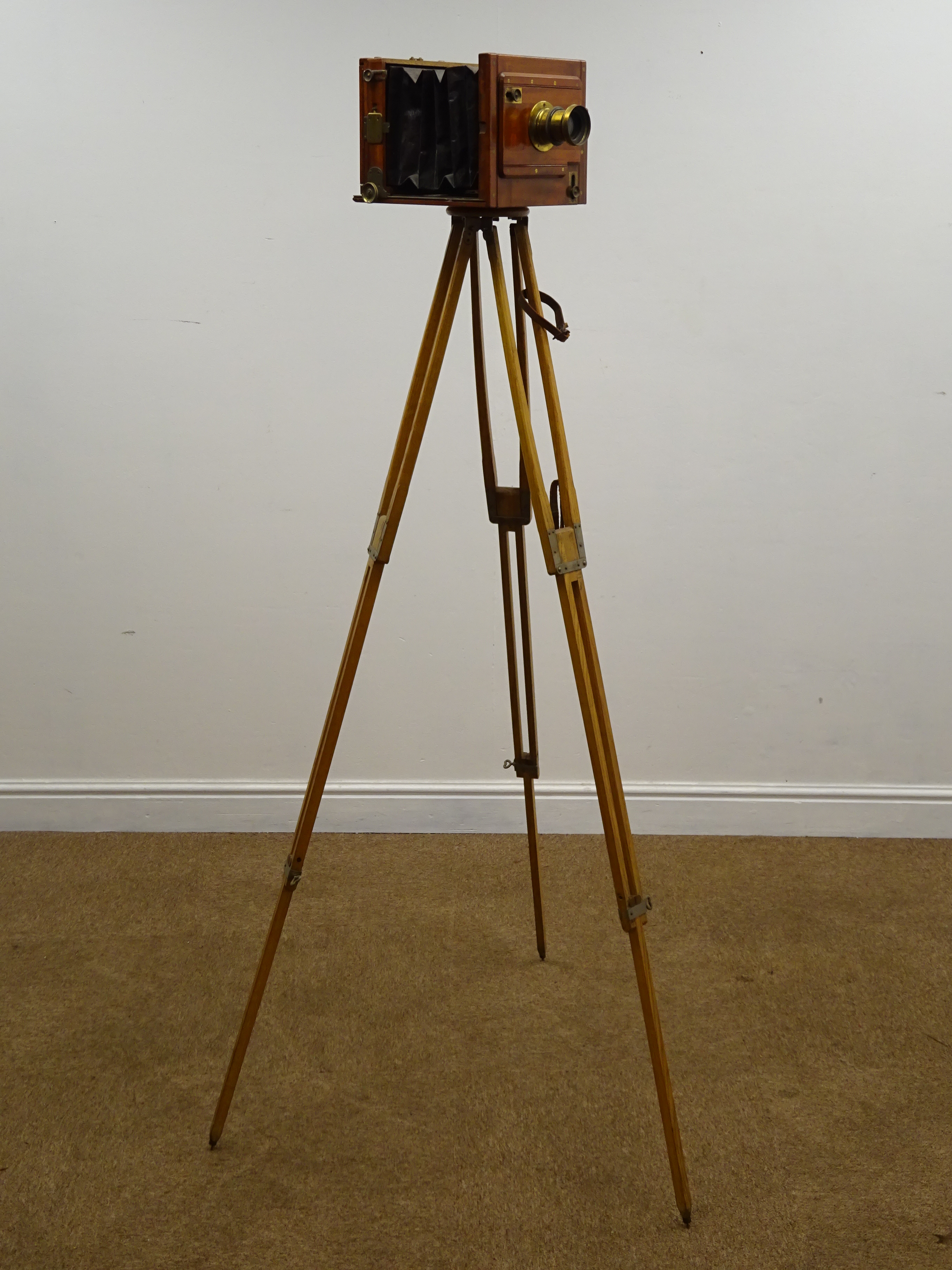 Mahogany and brass 41/2in x 6in plate folding tailbord camera with Universal Rapid Aplanat Serie E