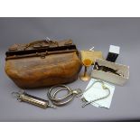 Doctors leather Gladstone bag with medical contents including shell and wound Dressings,