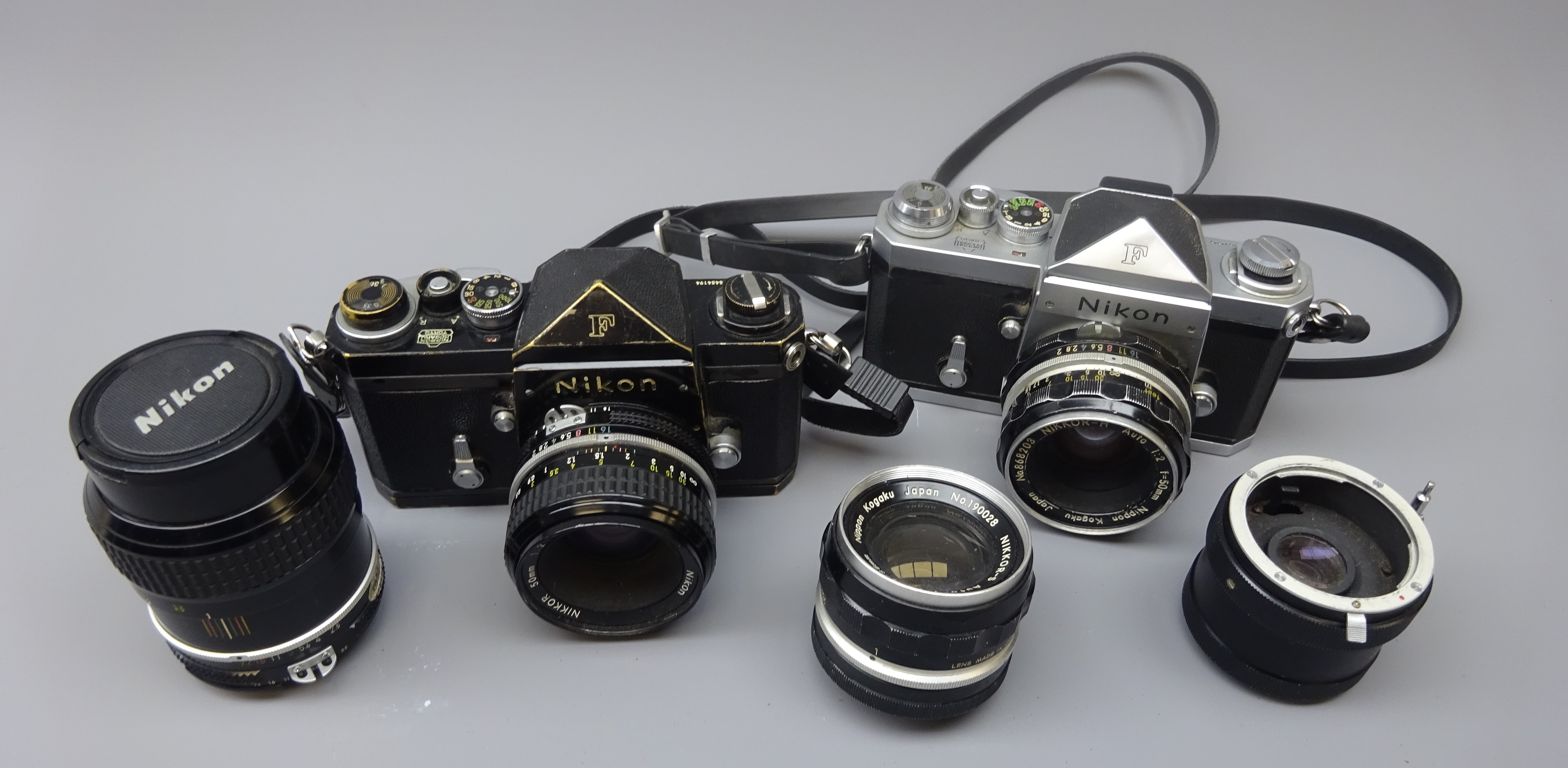 Nikon F camera No.6714747 with Nikkor-H Auto 1:2 f=50mm lens No.868203, a Nikon F black body No.