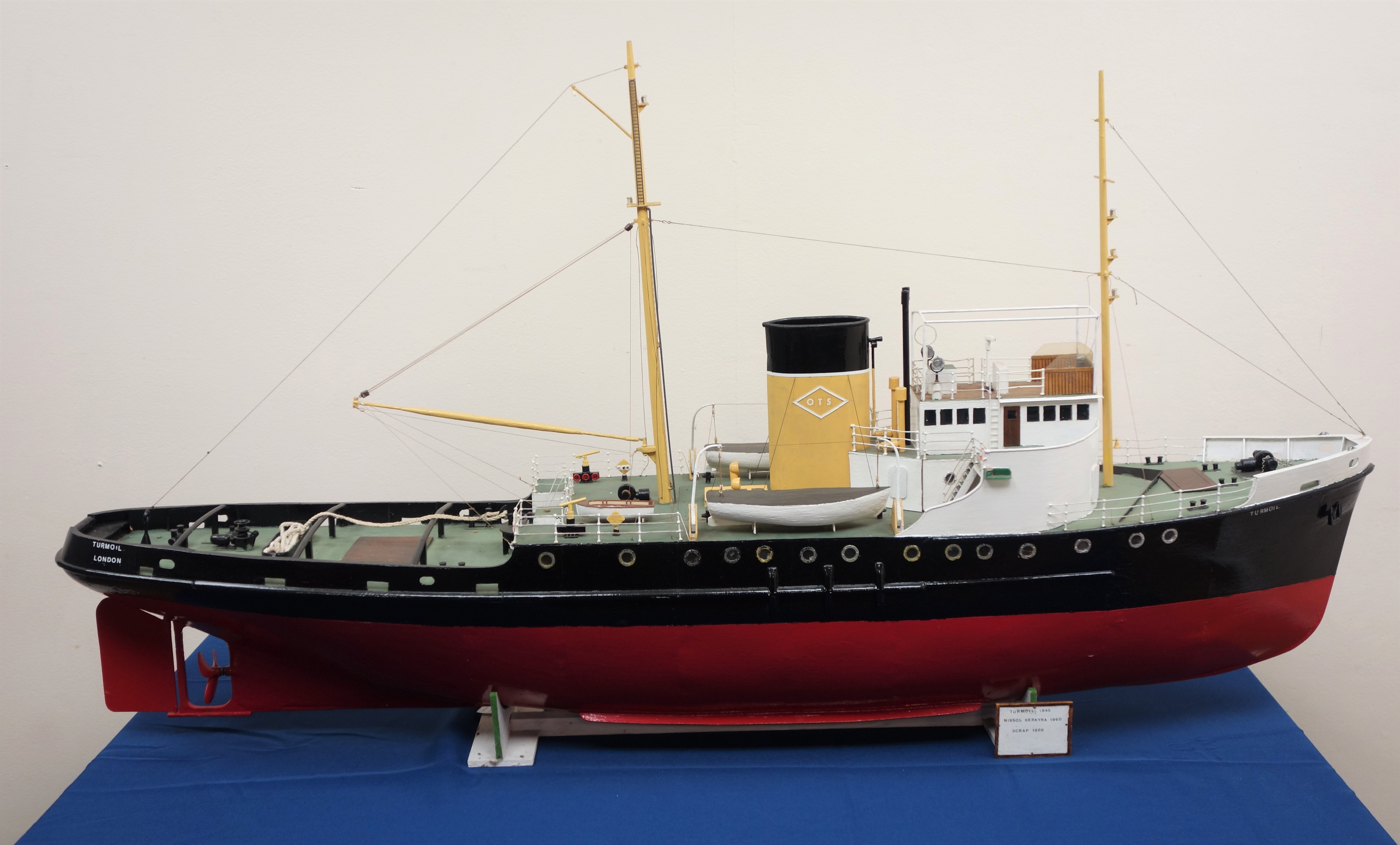 Large scale model of the motor Tug Turmoil, in OTS colours, on wooden stand, L135cm, W26cm, H66cm.