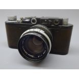 Leica 35mm film camera, Ernst Leitz Wetzlar D.R.P. No.91677, black with a Canon f1:1.