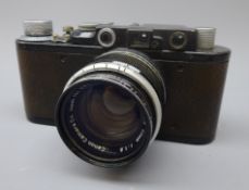 Leica 35mm film camera, Ernst Leitz Wetzlar D.R.P. No.91677, black with a Canon f1:1.