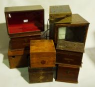 Fourteen wooden boxes/display cabinets formerly housing radios,