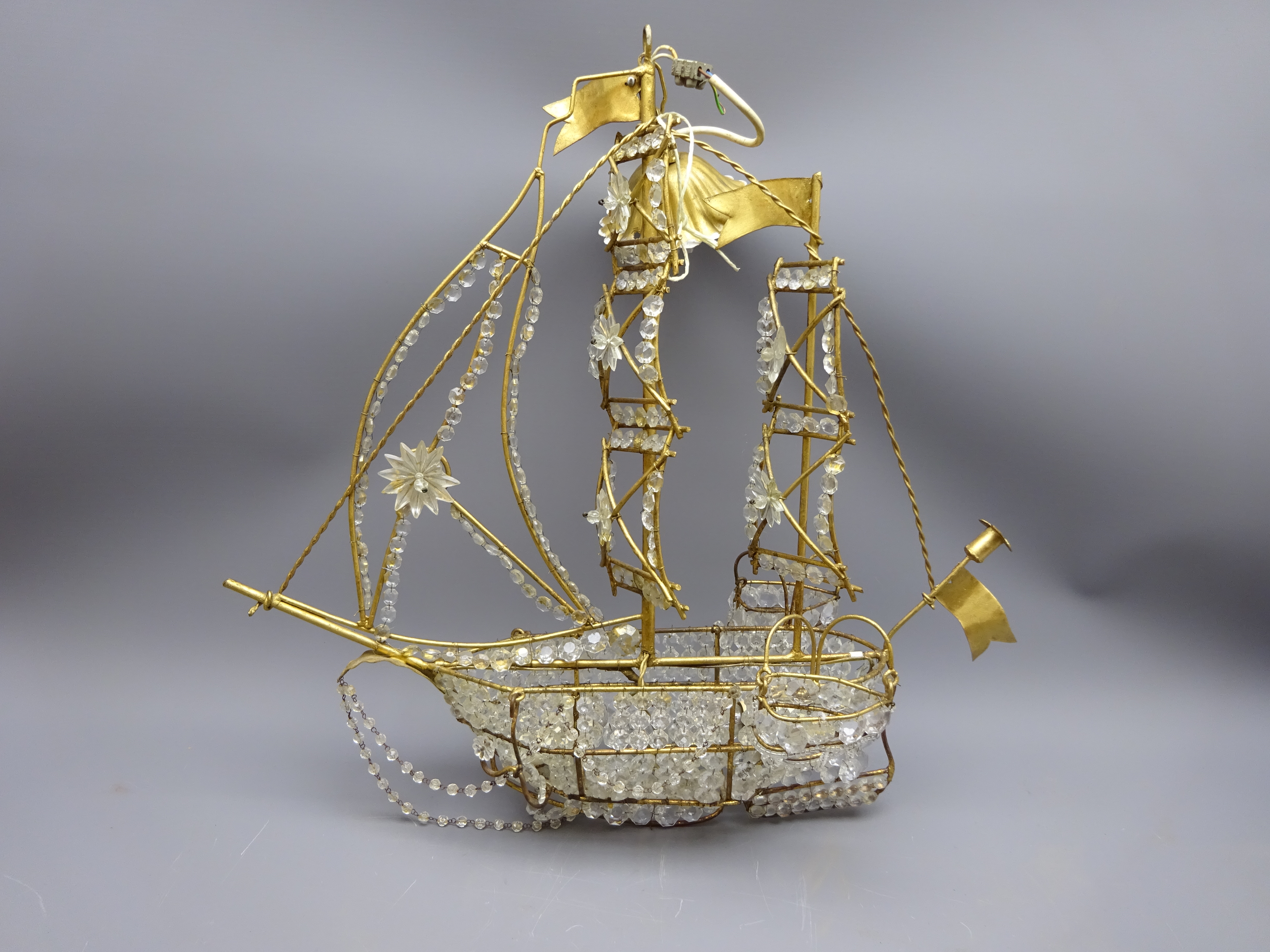 Unusual openwork metal hanging light fitting in the form of a two masted Galleon with lifeboats and