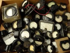 Over fifty assorted meters and dials including ammeters, voltmeters, galvanometers, etc,