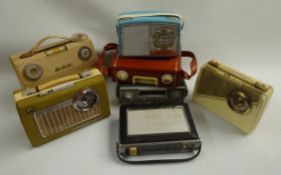 Seven vintage portable radios - KB Super 8, Sky Leader with shoulder strap, G.E.C.