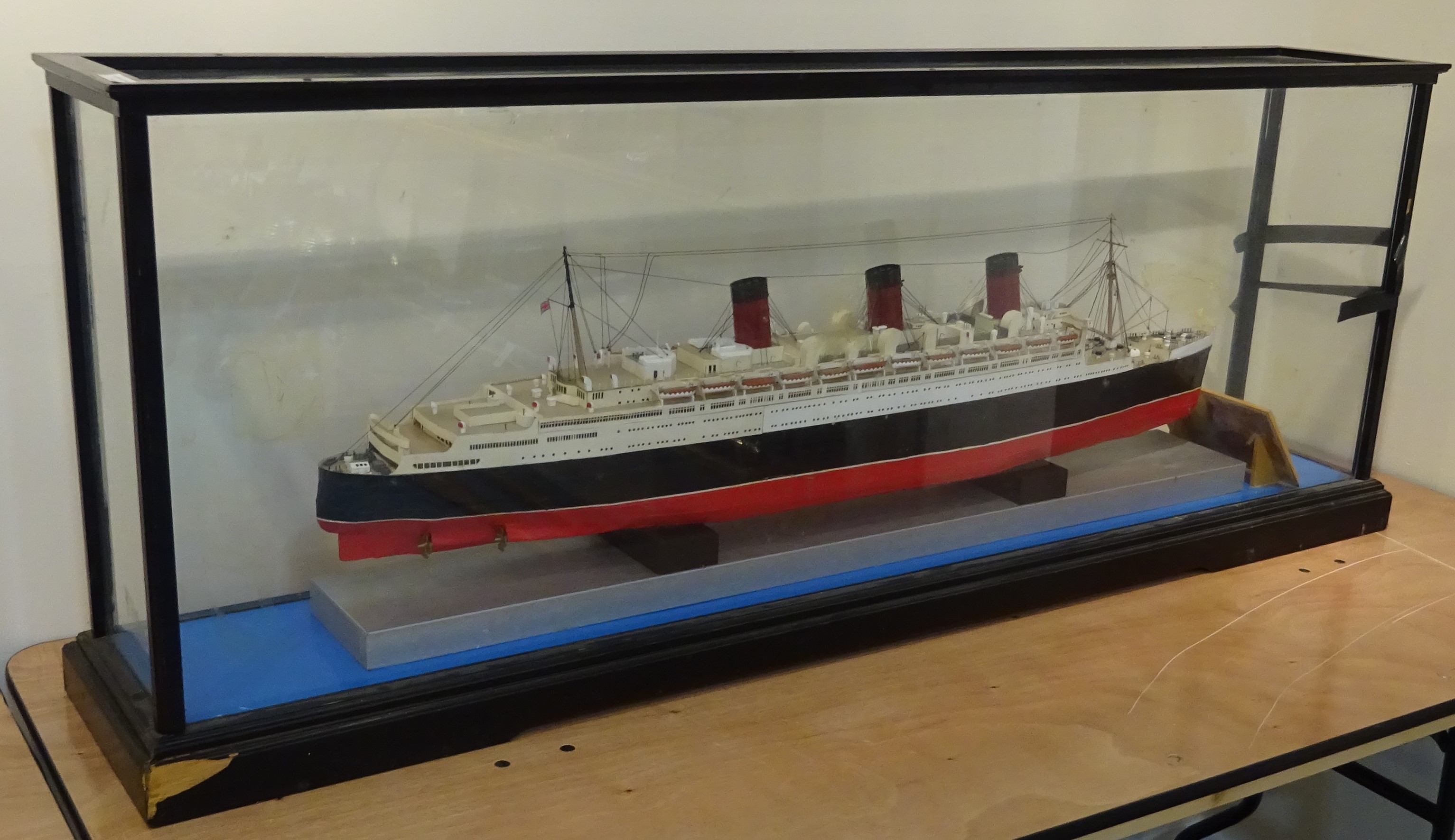 Large scale model of RMS Queen Mary, painted paper and card on frame,