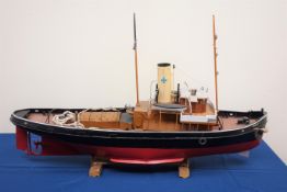 Large scale model of the Tug Joffre, on wooden stand, built from Model Boats Plans Service, L93cm,