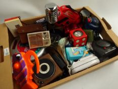 Over twenty novelty and promotional portable radios including Sanyo RP1711 dice, Tomy Mr. D.J.