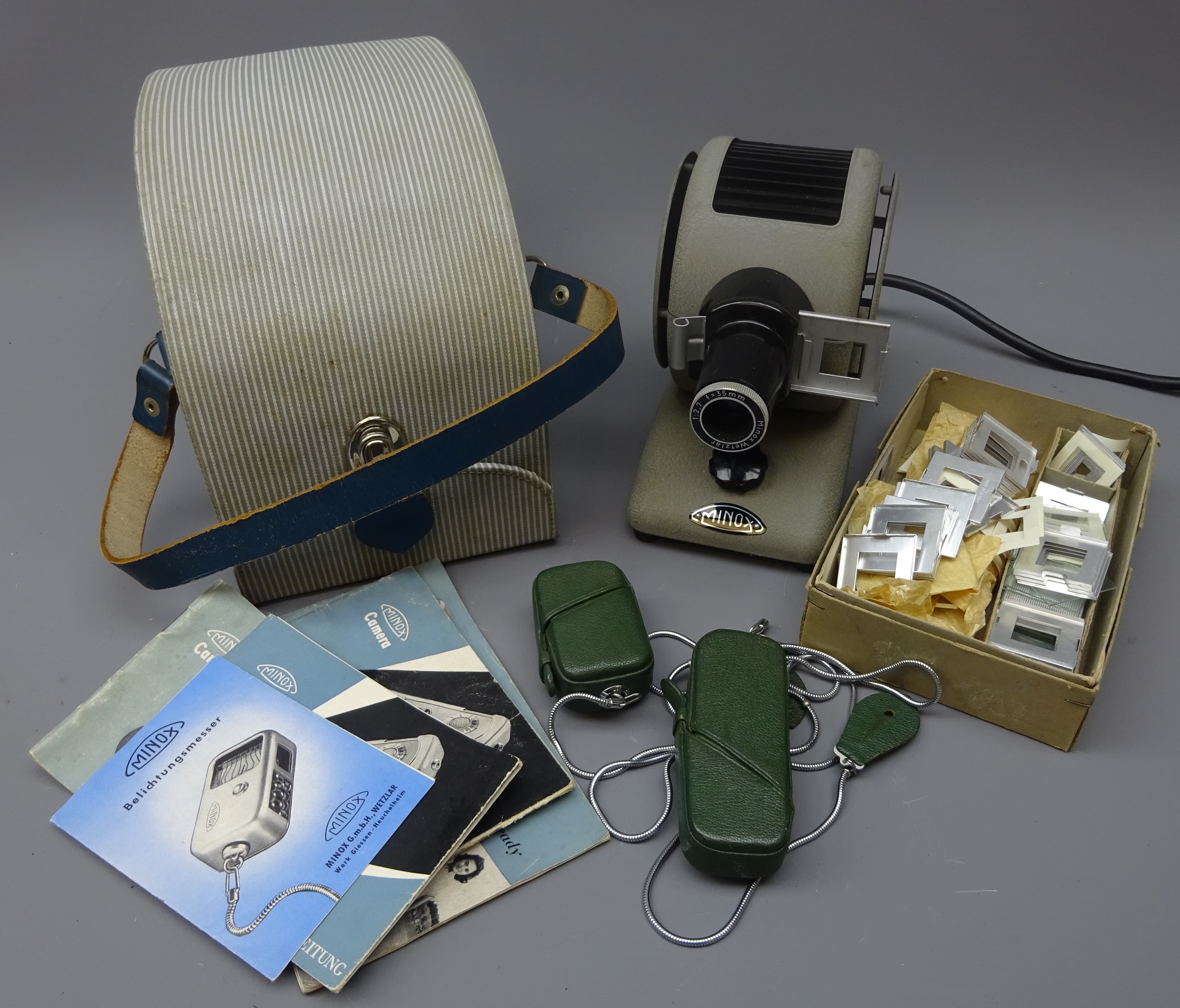 Minox Spy camera and light meter in green leather cases with manuals etc and a Minox slide