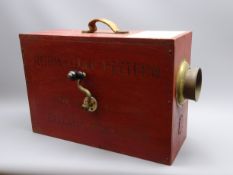 Norwegian Pattern rotary fog horn, red painted plywood body with paper label to the top,