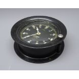 US Navy bulkhead timepiece, 24 hour circular dial with luminous numerals No.