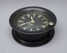 US Navy bulkhead timepiece, 24 hour circular dial with luminous numerals No.