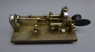 Chromed Morse Code key by Vibroplex of New York, on rectangular base with three rubber feet, L20cm,