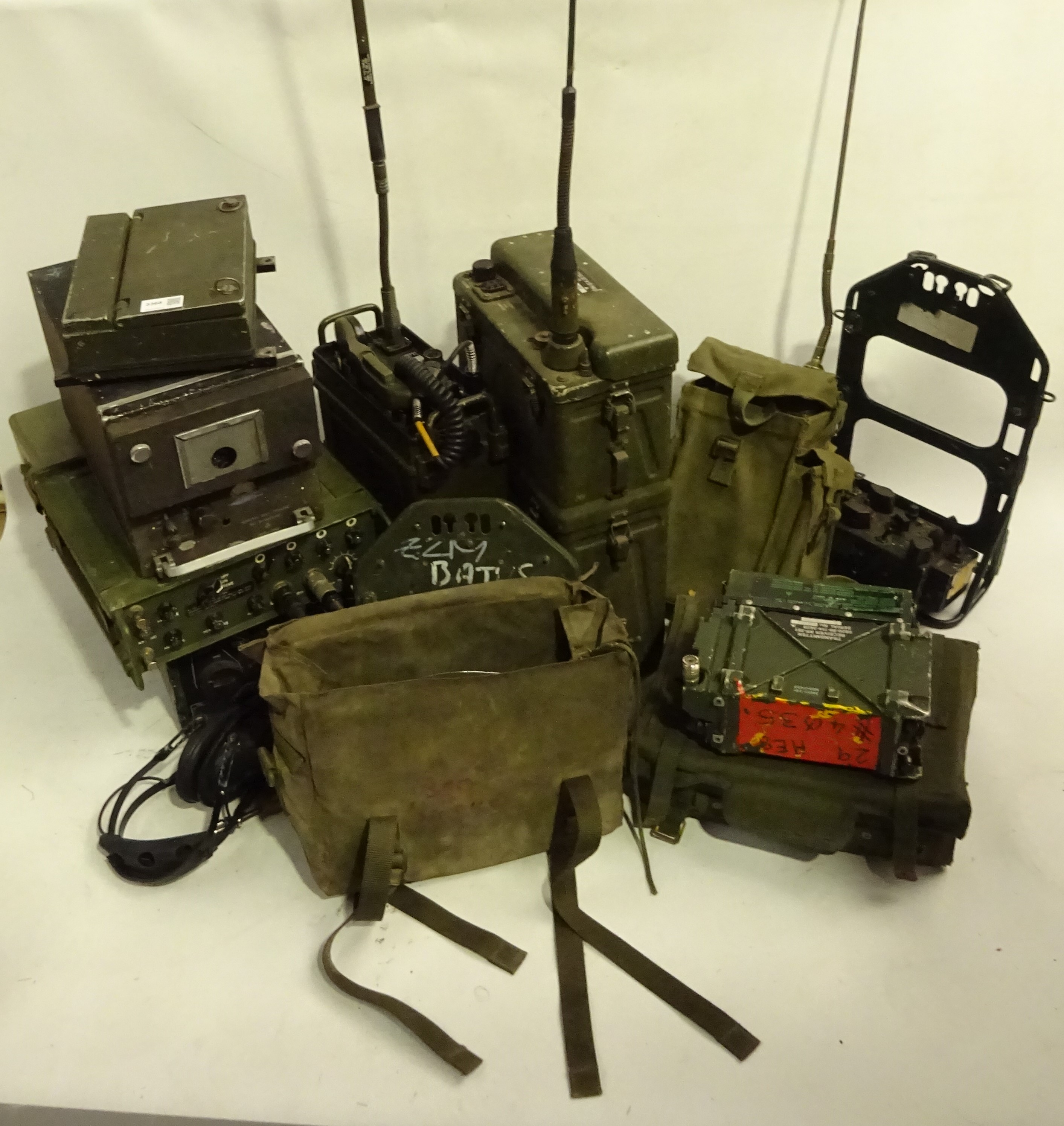Ex-military communication equipment including various backpack receiver/transmitters,