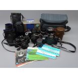 Canon camera bodies A-1, EOS 10 with box & EOS 1000, six lenses - FD 50mm 1:1.8, FD 28mm 1:2.