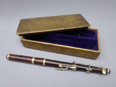 Rosewood two-piece six-key piccolo/fife with nickel mounts,