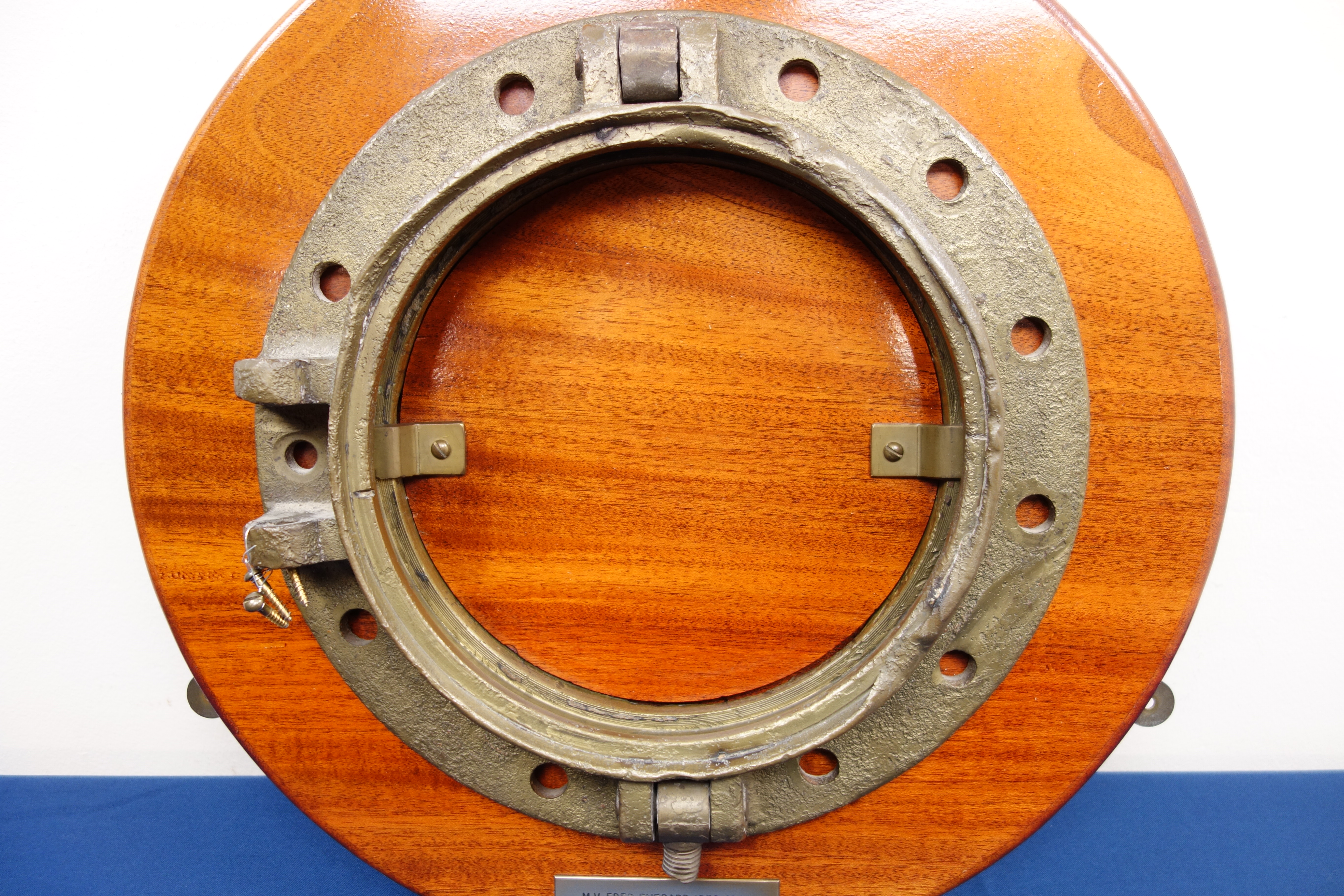 M.V Fred Everard - Large circular three bolt porthole on wooden plaque, D56cm. - Image 3 of 3