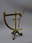 Victorian brass yarn scale by Goodbrand & Holland, Manchester on cast iron tri-form base,