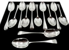 Twelve Edwardian silver dessert spoons,