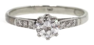18ct white gold single stone diamond ring, with diamond set shoulders, stamped 18,