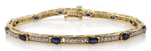 9ct gold oval sapphire and round brilliant cut diamond link bracelet,