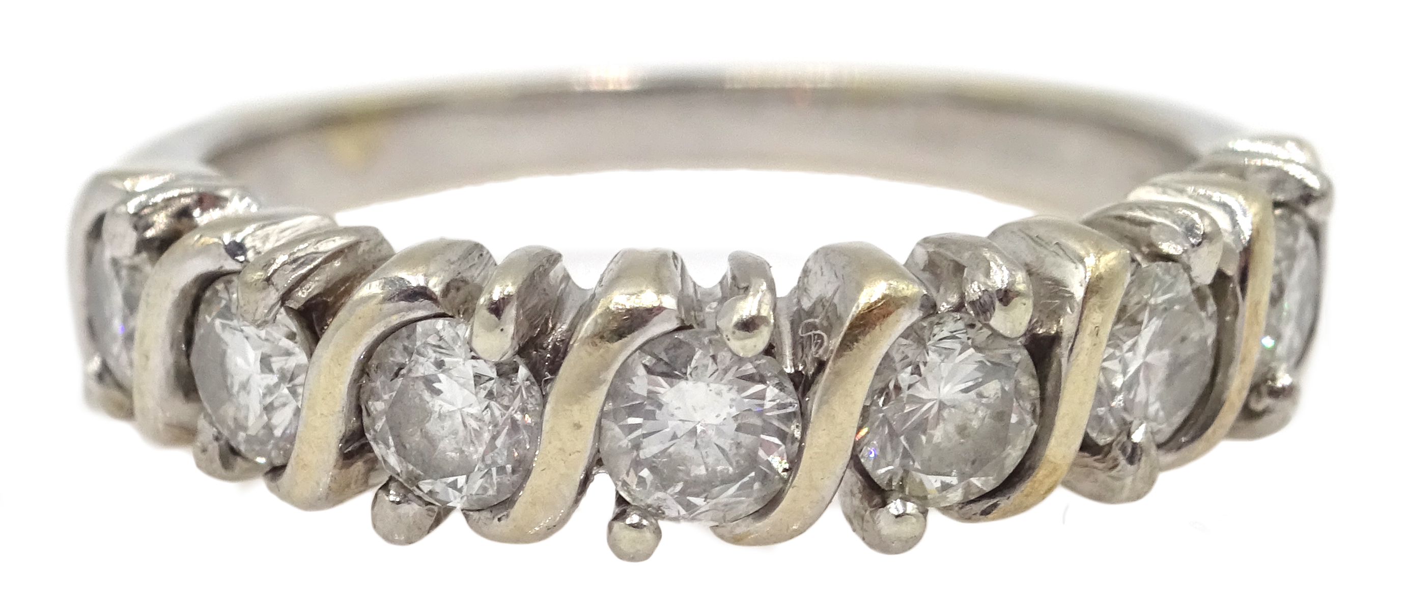 18ct white gold seven stone, round brilliant cut diamond fancy half eternity ring, stamped 750,