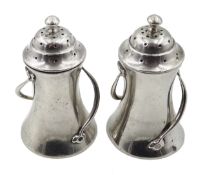 Pair of Art Nouveau silver pepperettes,