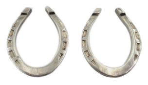 Pair of silver horseshoe napkin rings by H Hunt,
