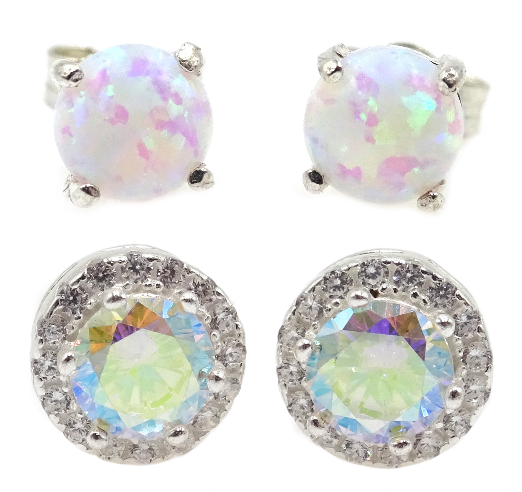 Pair of opal silver stud earrings and a pair of silver cubic zirconia cluster ear-rings