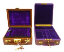 Two early 20th century velvet lined leather jewellery cases,