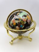 Table top semi-precious stone set terrestrial globe on brass base,