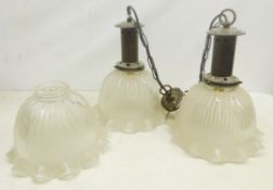 Pair Holophane style ribbed glass shades with frill rims with modern industrial style fittings and