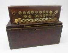 19th Century rosewood flutina accordion, with mother of pearl keys and brass fittings,