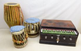 Kamal Harmonium and three Indian Tabla drums,
