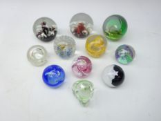 Eleven Caithness glass paperweights: Grace, Pastel, Reflections, two Mooncrystal,