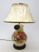 Ex Retail - Moorcroft baluster table lamp decorated in the Magnolia pattern,