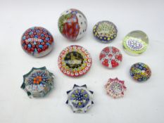 Collection of Millefiori glass paperweights including three star shaped by John Deacons and other