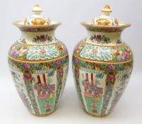 Pair Chinese Famille Rose style lidded jars printed with alternate panels of figures conversing in