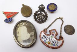 19th century enamel 'Brandy' decanter label, Royal Army Dental Corps cap badge,