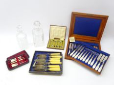 Edwardian cased set twelve fish eaters with mother-of-pearl carved handles,